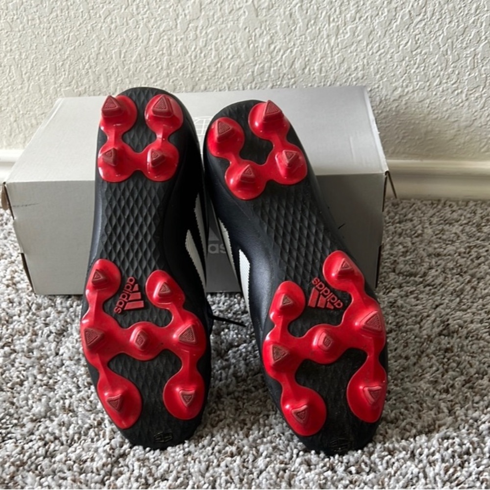 Adidas Black Cleats with Red Bottoms - Picture 2 of 3